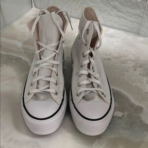 Converse White Sneakers with Classic High-Top Style and Canvas Material